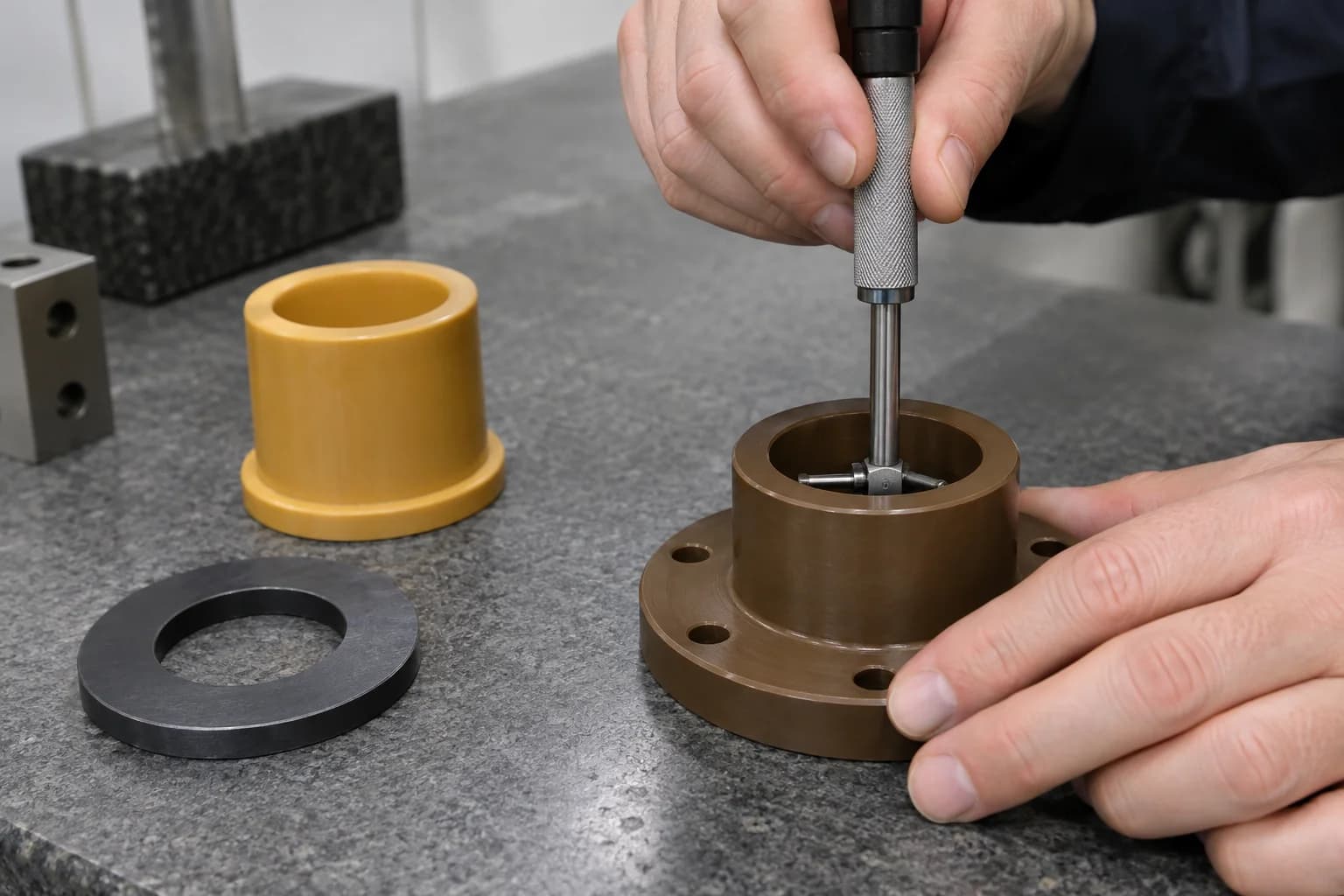Illustrative bore inspection of a PAI flanged component on a granite table